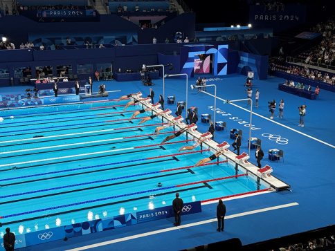 Mrs Rinehart and Dawn Cheer Matt Temple on the 100m Butterfly final
